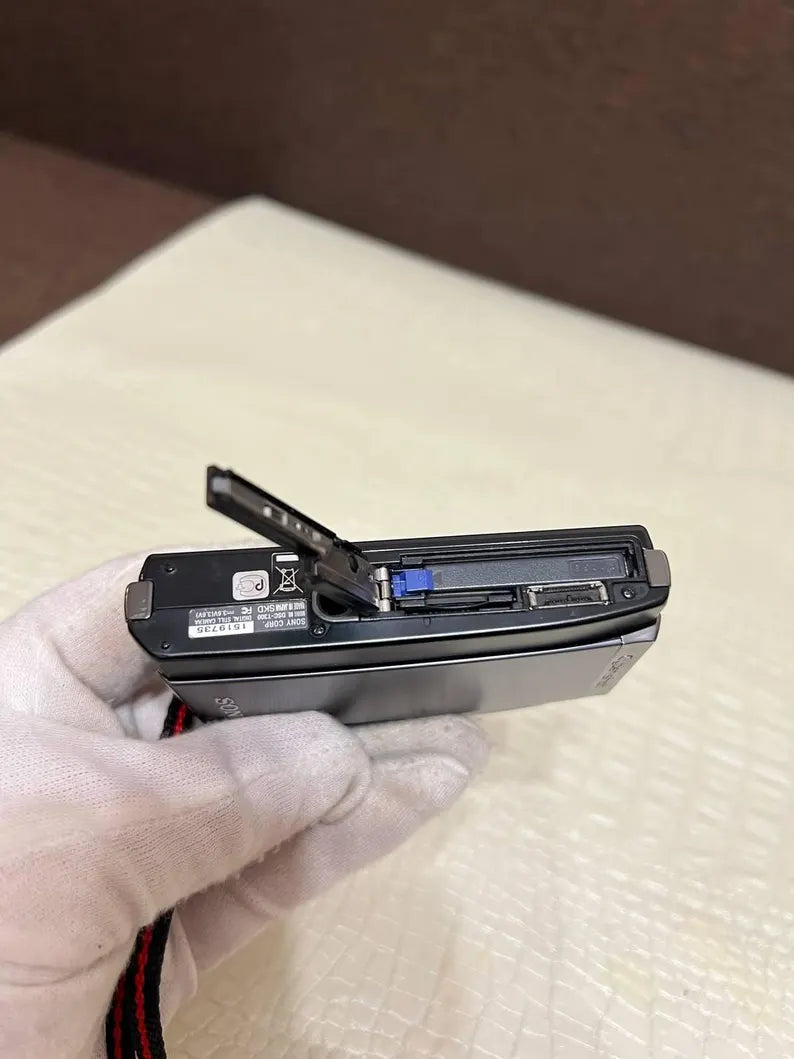 Sony Cybershot DSC-T300 10.1MP Digital Camera + charger and memory card