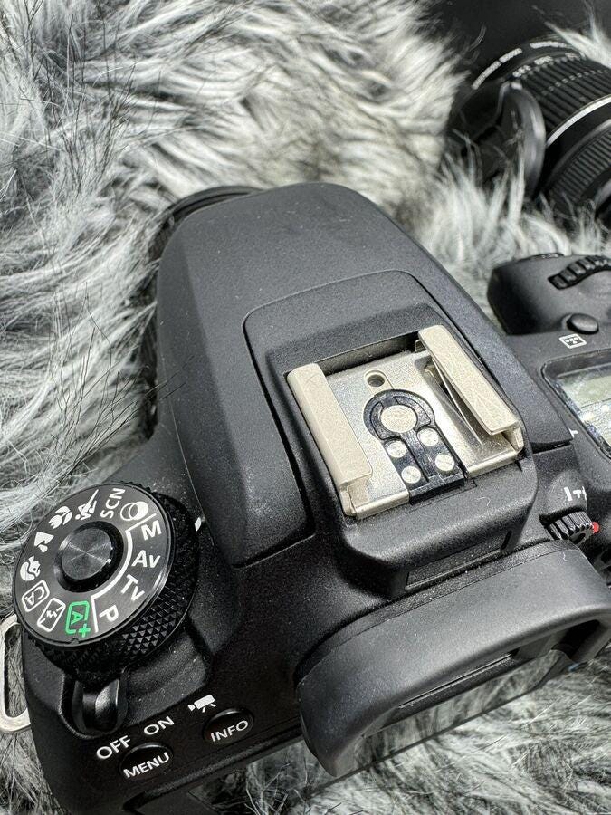 Canon EOS 77D 24.2 MP Digital SLR Camera with ef-s 18-55mm & ef-s 55-250mm Lenses